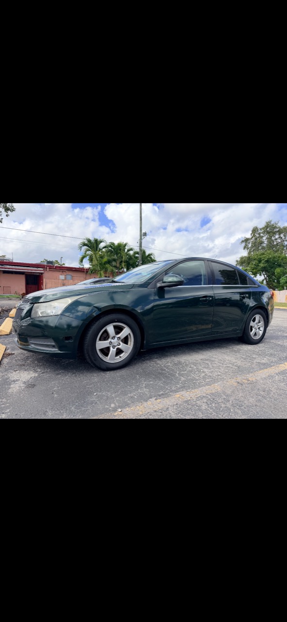 Green sedan — Dark Green, view 1